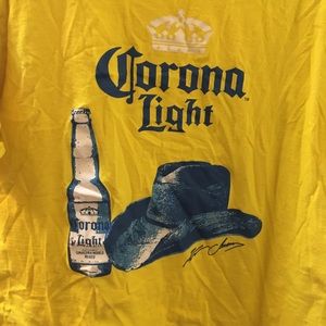 Xl shirt that has “corona light” written on it   Yellow. Mens or women’s